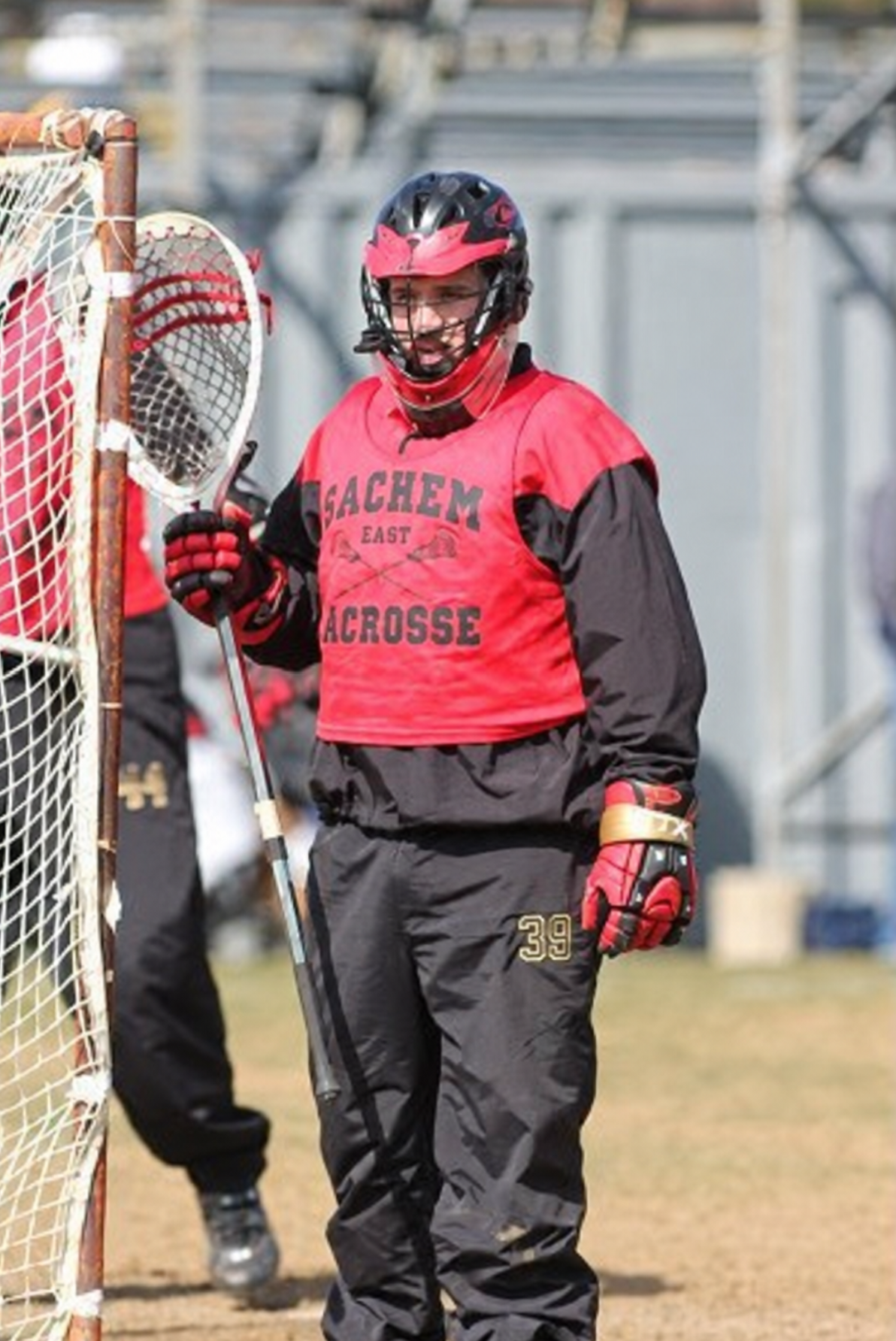 Brett Fink playing goalie for Sachem East Lacrosse